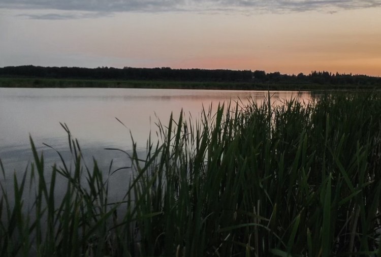 A sunset over North Buck Lake in Athabasca Alberta